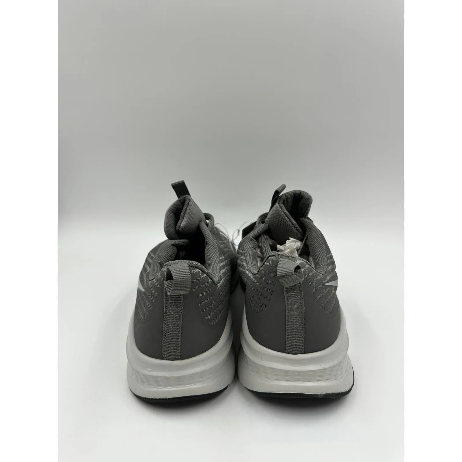 Men's Size 10, Gray Low Top Running Sneakers with White Soles and Running Tread